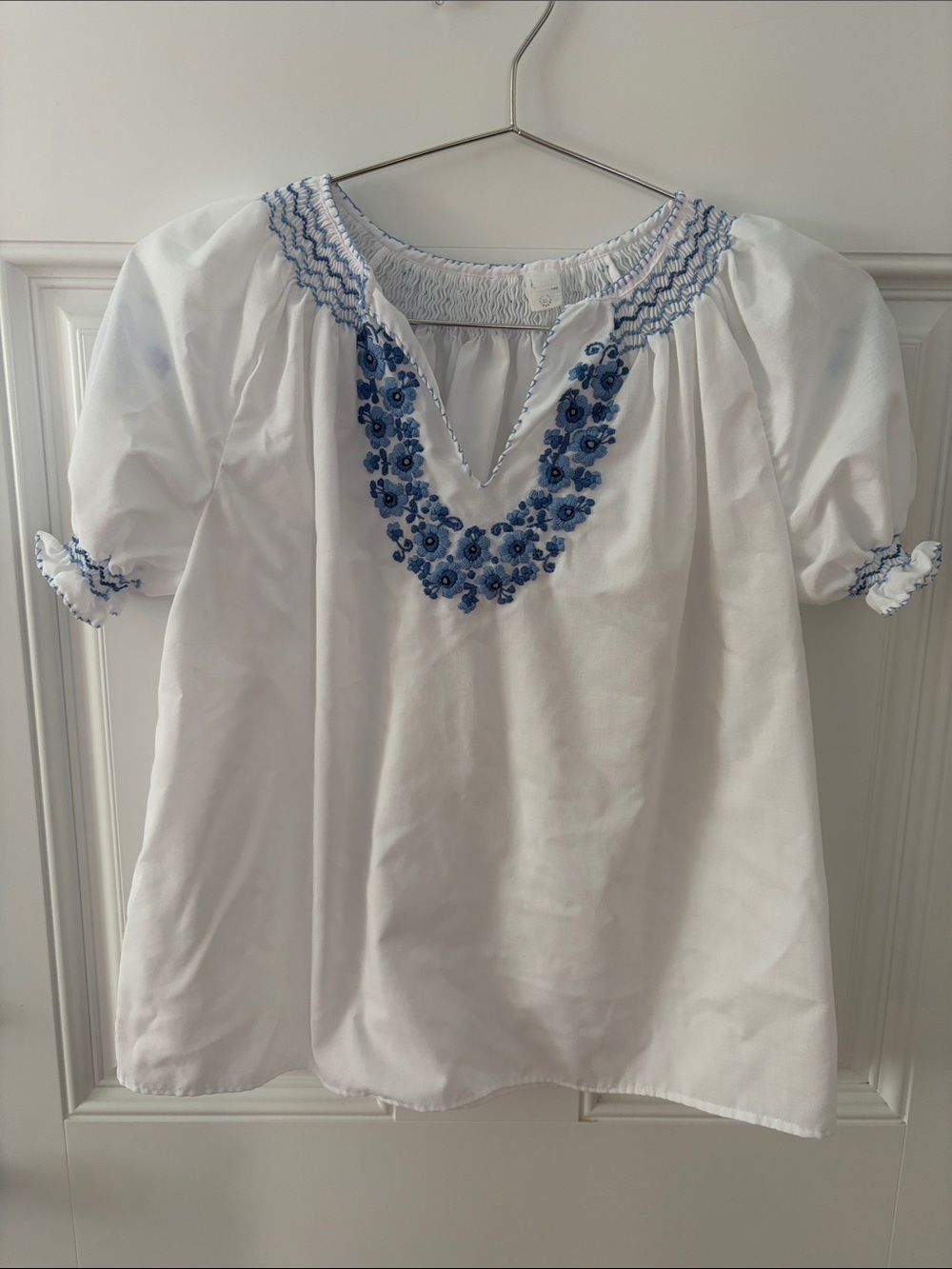 White Top with Blue Floral Embroidery